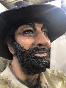 life-like human statues